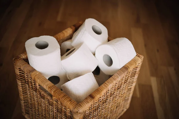 Several toilet papers in a box