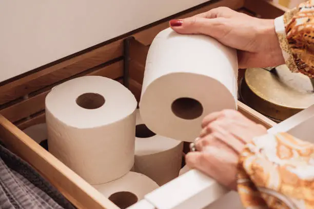 Toilet paper storage in bathroom drawer